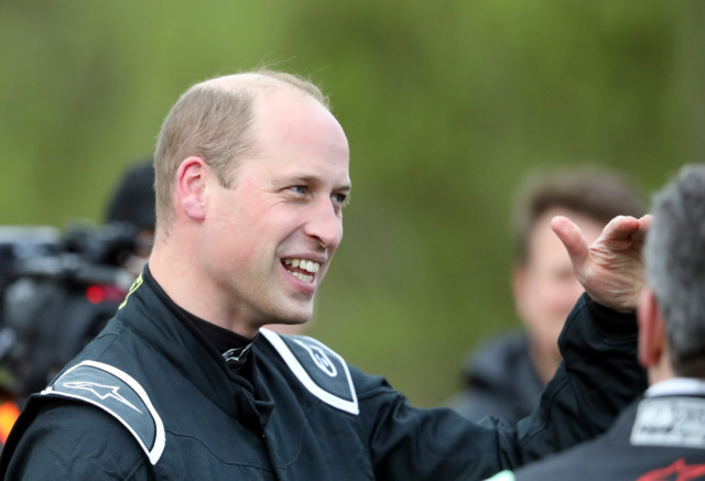 Prince William appeared to be in high spirits before taking the racing car for a spin