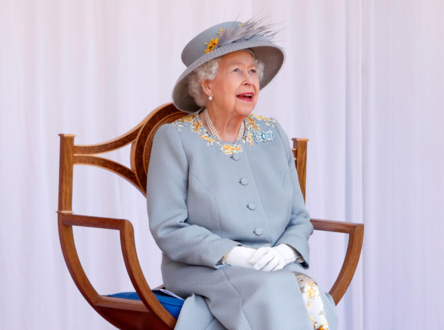 The Queen gazed up as the show unfolded