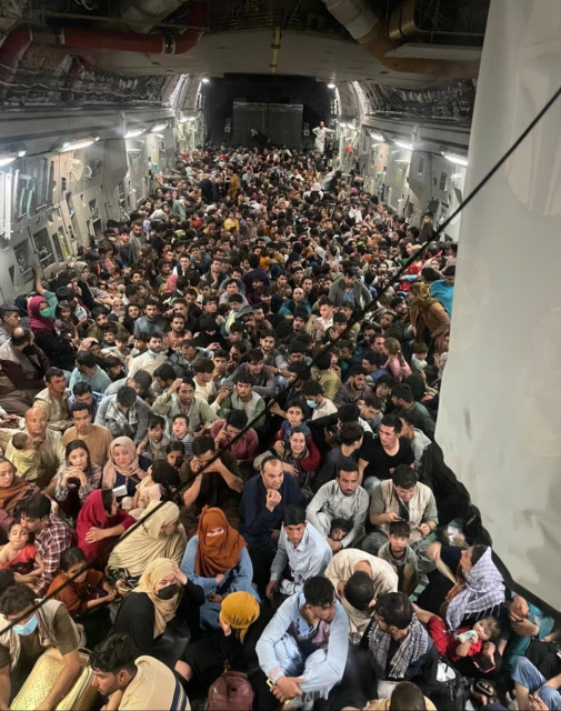 The unbelievable image shows 640 terrified Afghans on the US cargo jet
