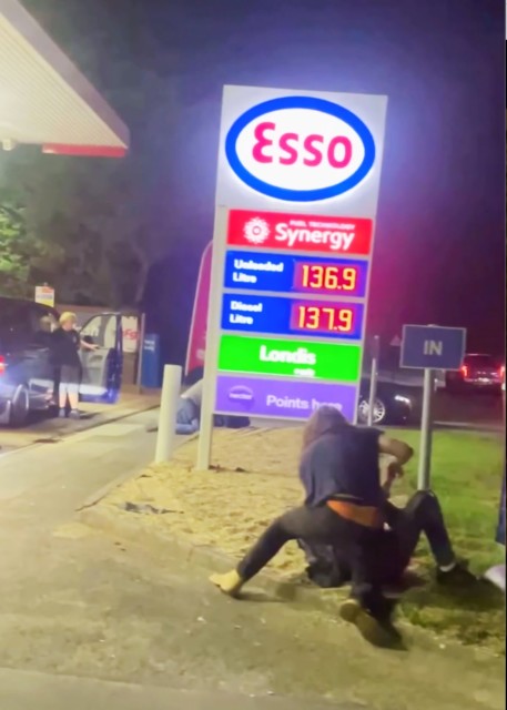 Two young men fought it out on the forecourt of an Esso fuel station