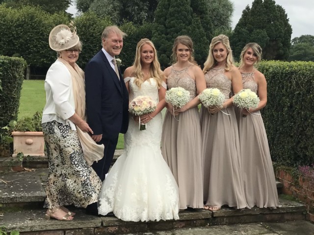 Sir David Amess with his wife Julie at daughter Alexandra's wedding with his other girls as bridesmaids