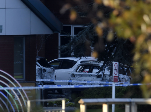 Two burnt-out cars could be seen in the car park of Liverpool Women's Hospital