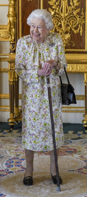 Her Majesty was pictured using a walking stick at Windsor Castle, Berks, last week