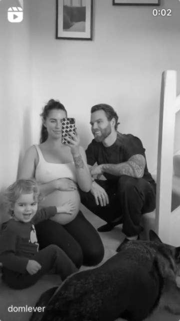 Jess and Dom with their son and a baby on the way